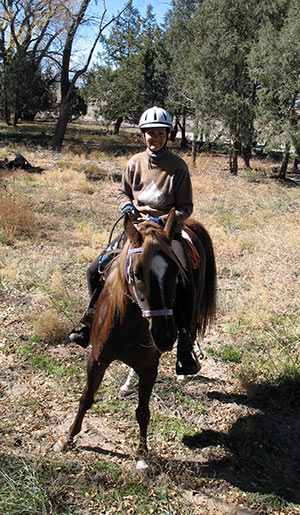 Shantara riding her horse in crestone, colorado (photo by Virochana)